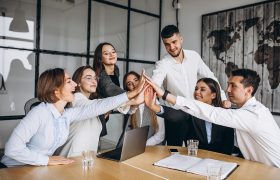 Group of people working out business plan in an office